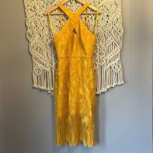 NWT. BCBGMAXAZRIA golden yellow cross-cross dress. Size 6.